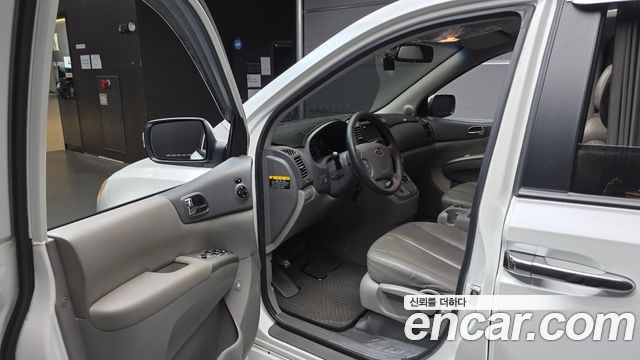 Kia Canival 2013 — photo 13