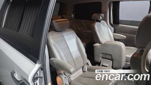 Kia Canival 2013 — photo 18