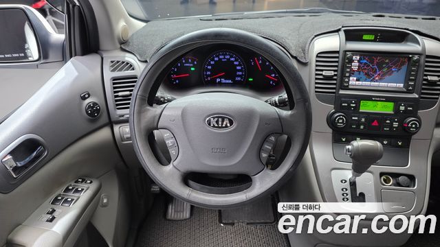 Kia Canival 2013 — photo 19