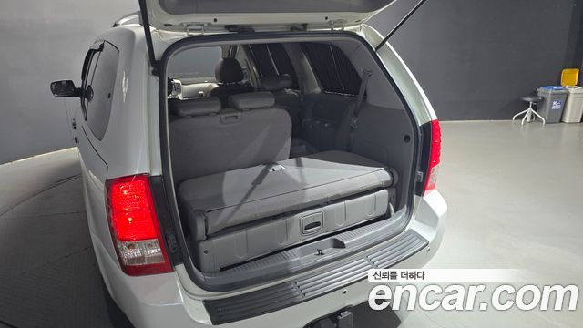 Kia Canival 2013 — photo 26
