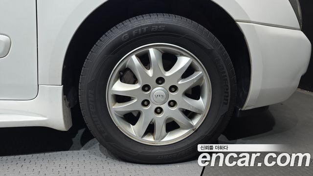 Kia Canival 2013 — photo 7