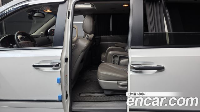 Kia Canival 2013 — photo 16