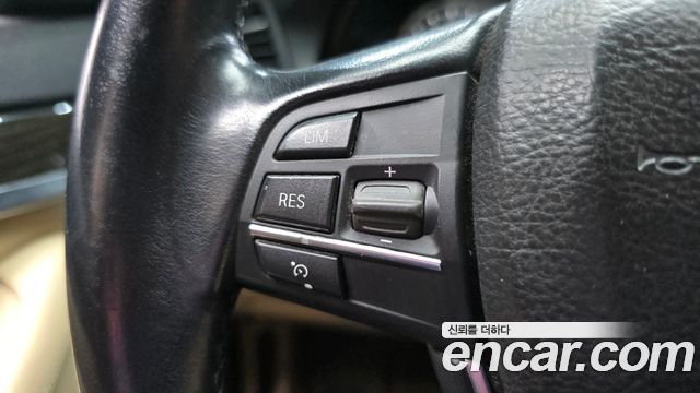 BMW 5-Series 2015 — photo 17