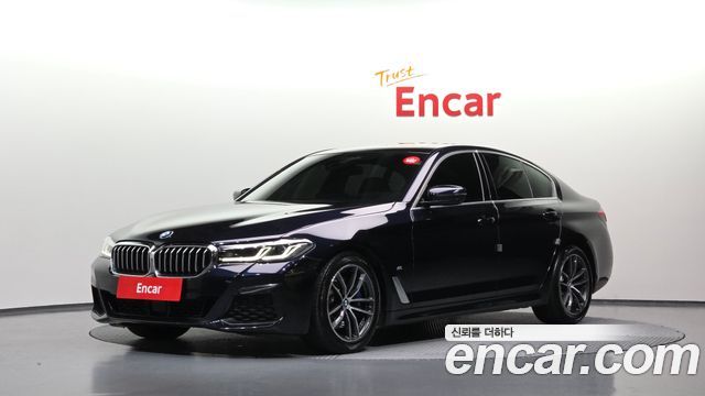 BMW 5-Series 2023 — photo 1