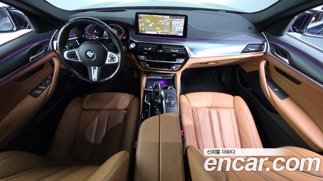 BMW 5-Series 2023 — photo 10