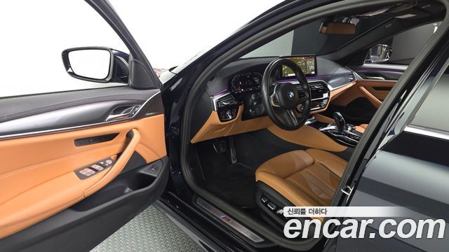 BMW 5-Series 2023 — photo 13