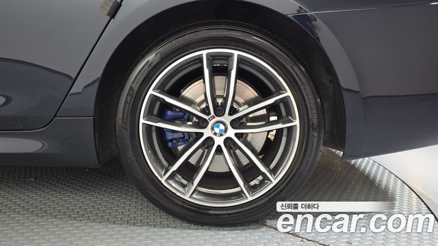 BMW 5-Series 2023 — photo 7