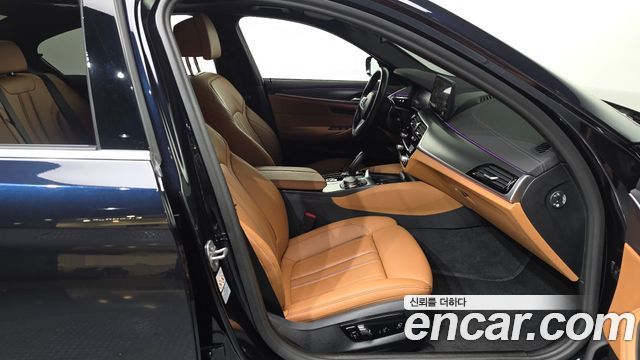 BMW 5-Series 2023 — photo 16