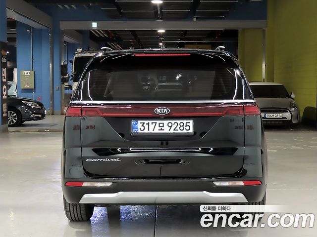 Kia Canival 2021 — photo 3