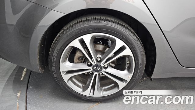 Kia K3 2013 — photo 5