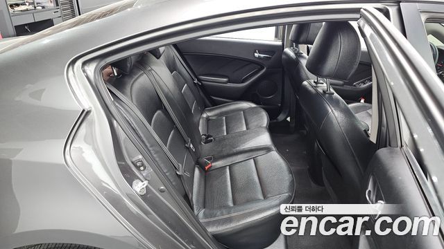 Kia K3 2013 — photo 11