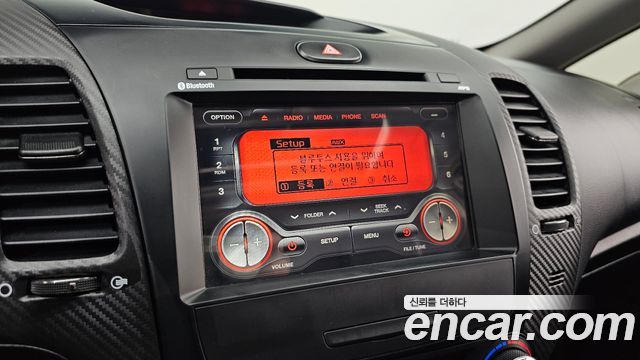 Kia K3 2013 — photo 15