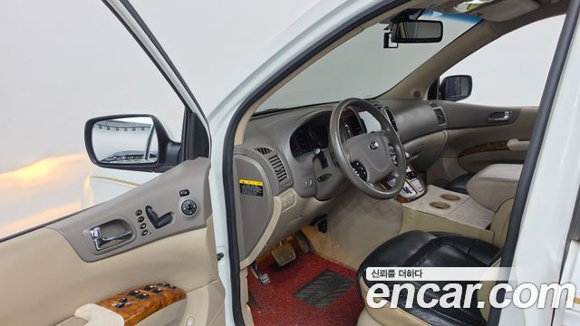 Kia Canival 2014 — photo 13