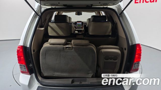 Kia Canival 2014 — photo 21