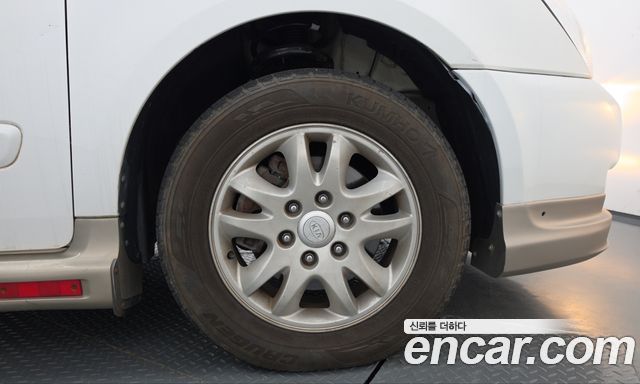 Kia Canival 2014 — photo 7
