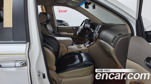 Kia Canival 2014 — photo 16