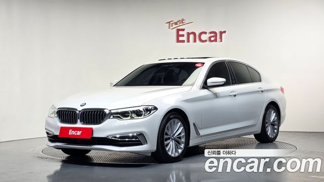 BMW 5-Series 2019 — photo 1
