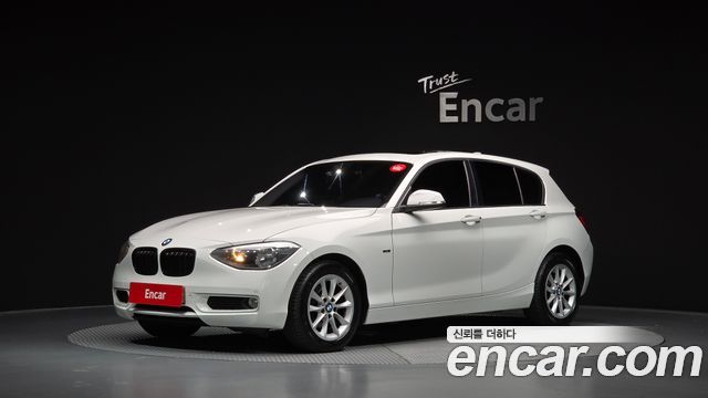 BMW 1-Series 2014 — photo 1