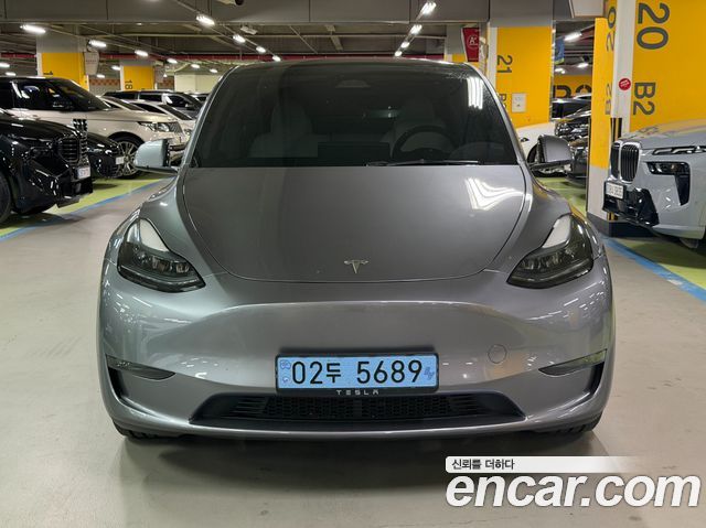 Tesla Model Y 2024 — photo 2
