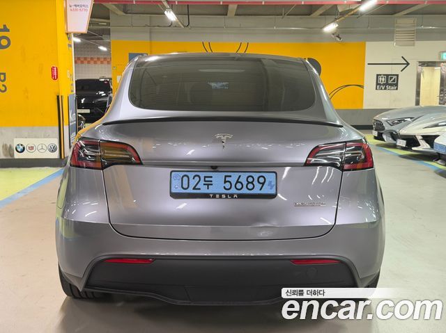 Tesla Model Y 2024 — photo 4