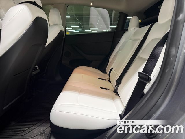 Tesla Model Y 2024 — photo 12