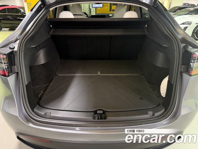 Tesla Model Y 2024 — photo 16