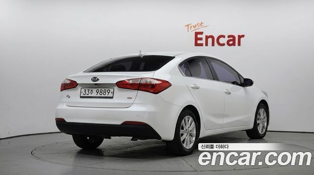 Kia K3 2013 — photo 2