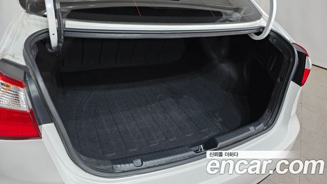 Kia K3 2013 — photo 20