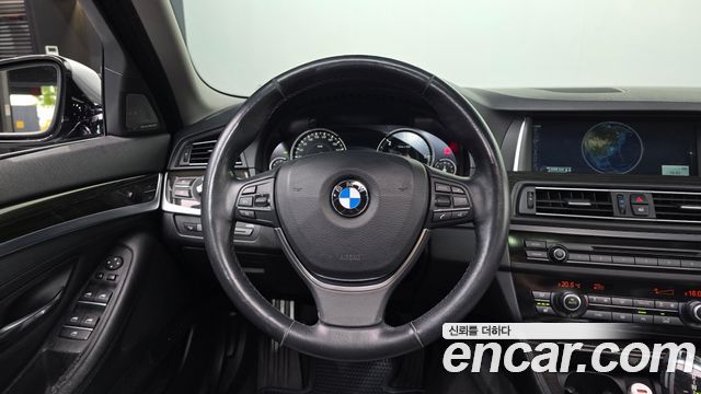 BMW 5-Series 2014 — photo 18