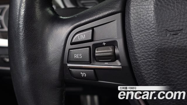 BMW 5-Series 2014 — photo 21