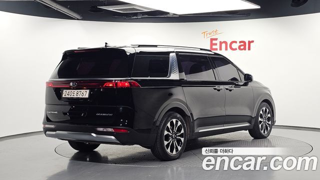 Kia Canival 2021 — photo 2