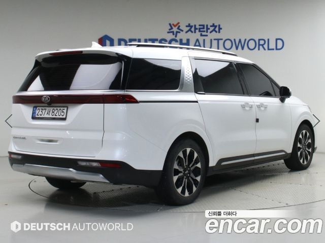 Kia Canival 2021 — photo 2