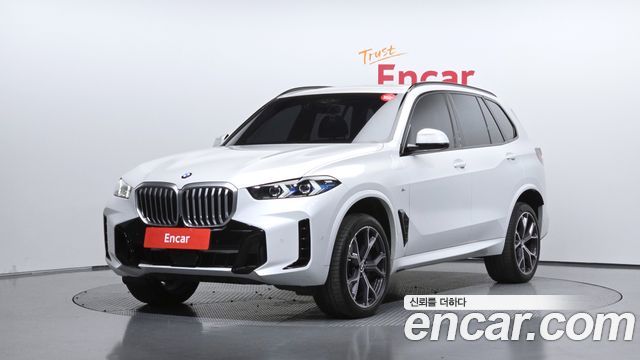 BMW X5 2024 — photo 1
