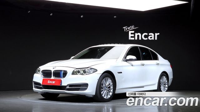 BMW 5-Series 2014 — photo 1