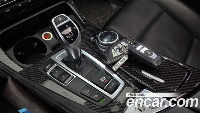 BMW 5-Series 2014 — photo 9