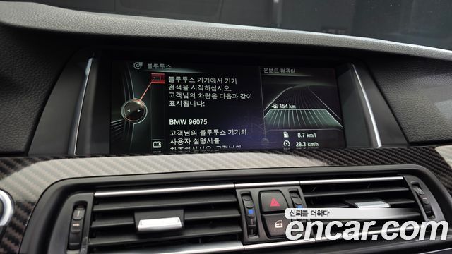 BMW 5-Series 2014 — photo 14