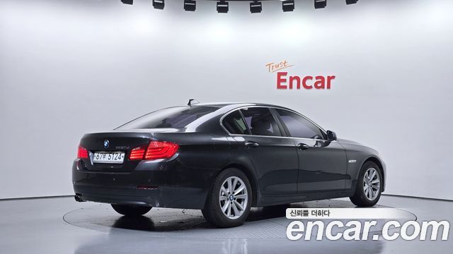 BMW 5-Series 2010 — photo 2