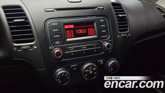 Kia K3 2015 — photo 16