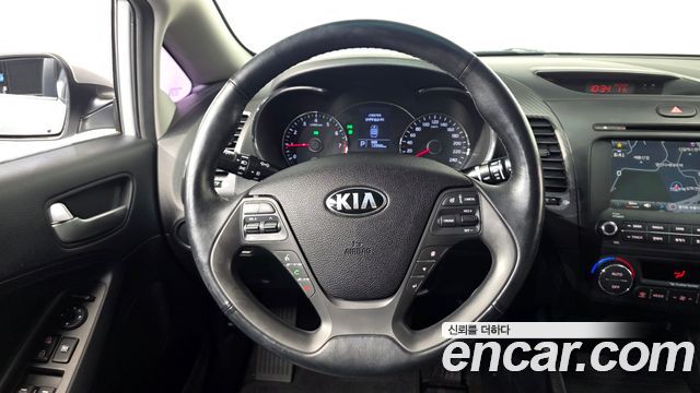 Kia K3 2015 — photo 19