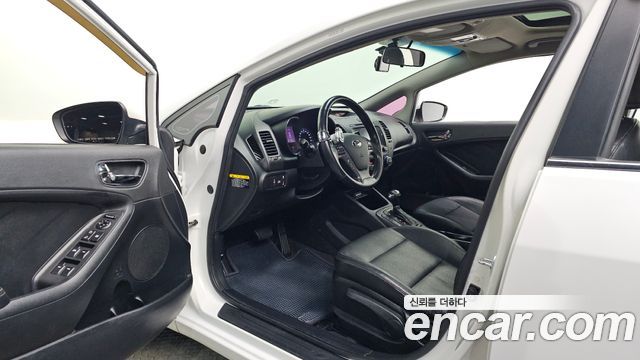 Kia K3 2013 — photo 13