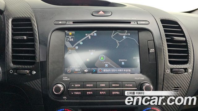 Kia K3 2013 — photo 24