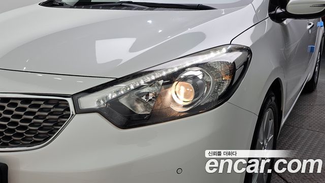 Kia K3 2013 — photo 8