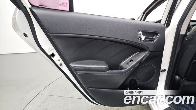 Kia K3 2013 — photo 15