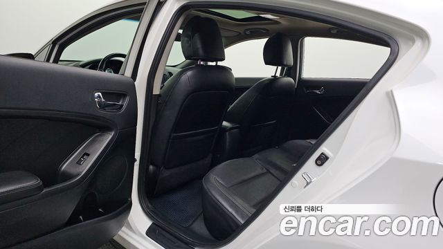 Kia K3 2013 — photo 16
