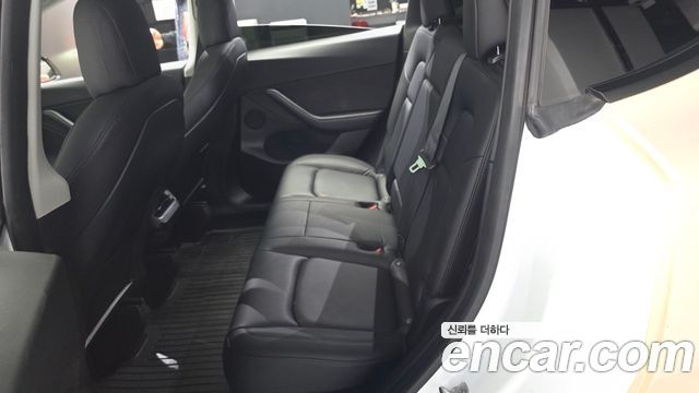Tesla Model Y 2021 — photo 18