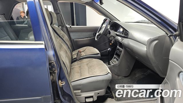 Kia Avella 1995 — photo 11