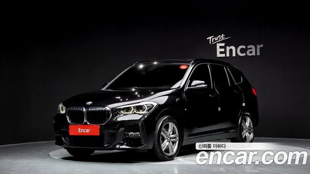 BMW X1 2021 — photo 1