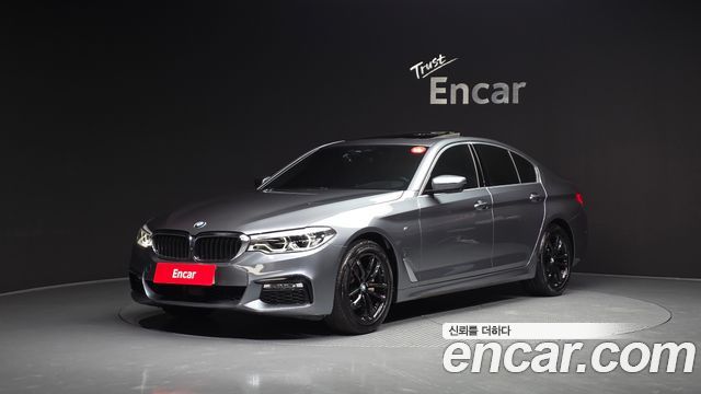 BMW 5-Series 2018 — photo 1