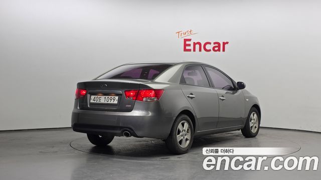 Kia Porte 2011 — photo 2