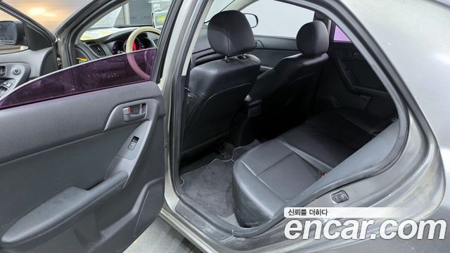 Kia Porte 2011 — photo 11